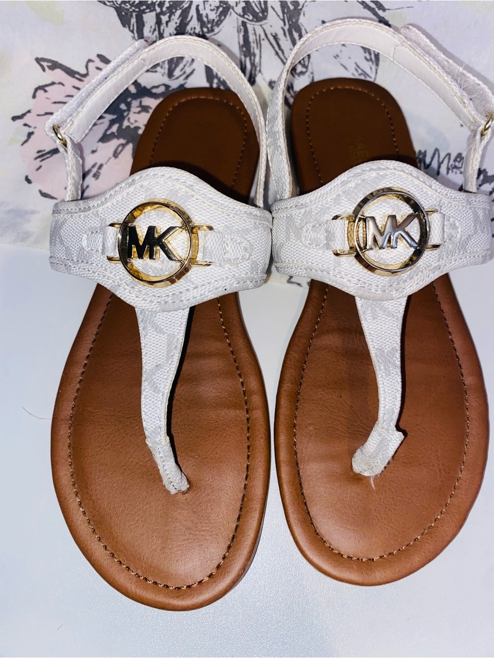 Michael Kors White Logo Thong Sandals with Gold MK Emblems